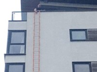 Escape ladder fitted to side of building means easy escape should there be a fire or flood